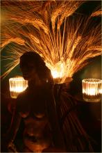 Statue of the Goddess with wheat rising behind Her